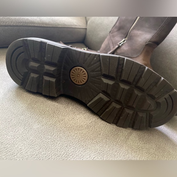 USED. Ugg All weather leather boots. 10.5, Brown, buckle and side zippers. - Picture 3 of 5